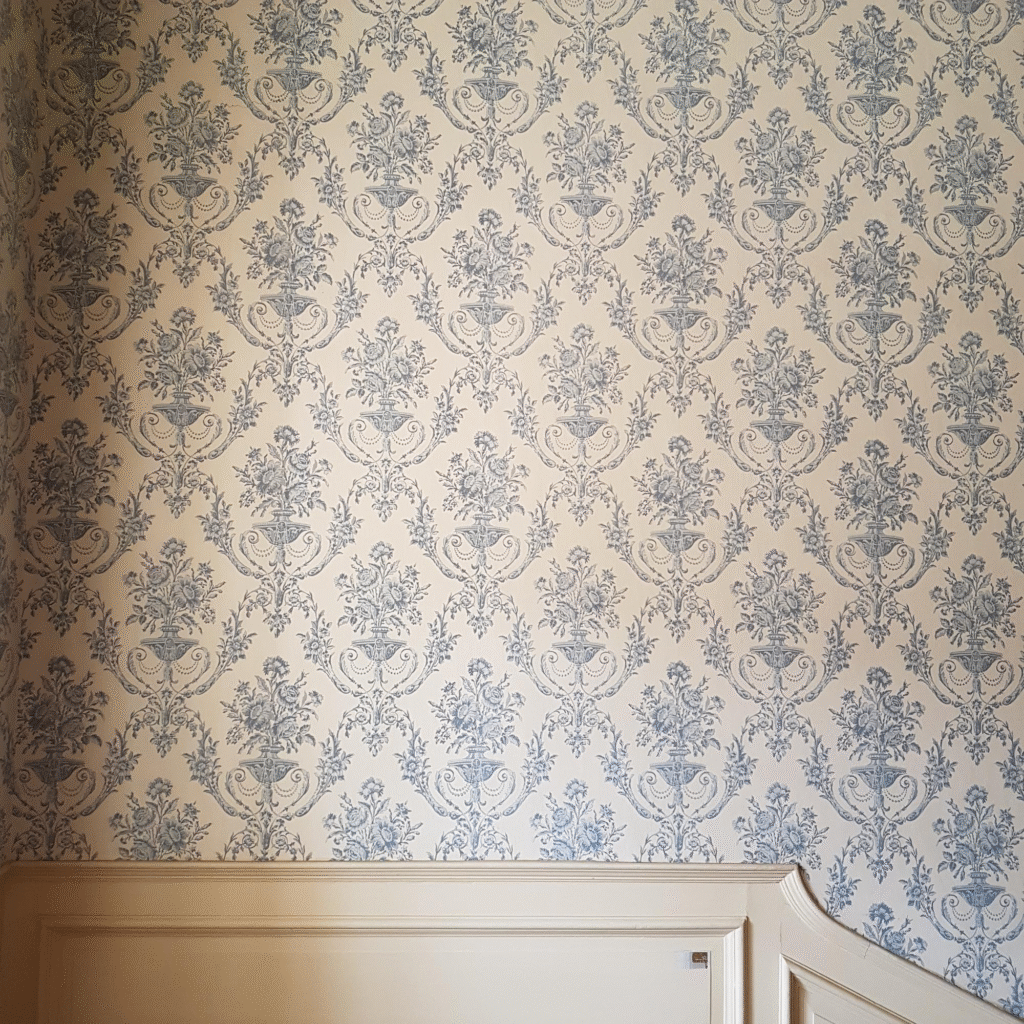toile pattern wallpaper in home
