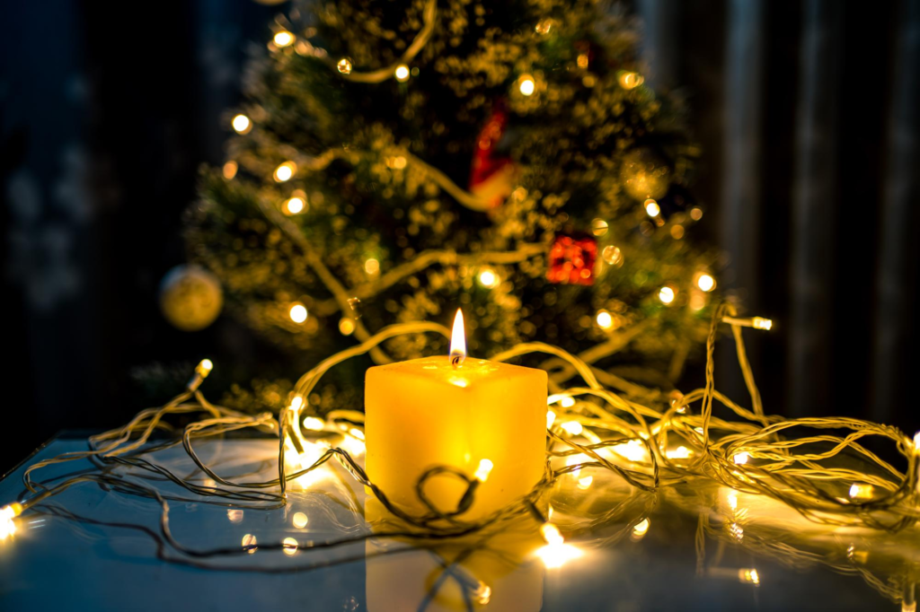 christmas tree with lights and candles