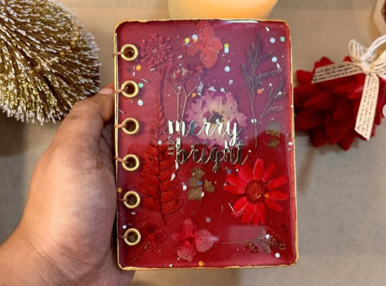 christmas-themed resin journal by Kaivela
