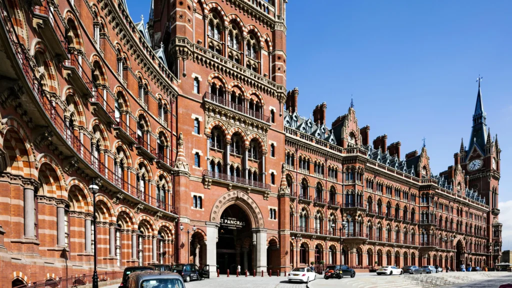Victorian Gothic architecture with ornate brickwork and arched windows.