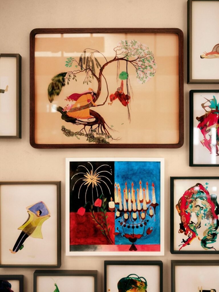 Anamika Khanna’s wall with colorful artwork.